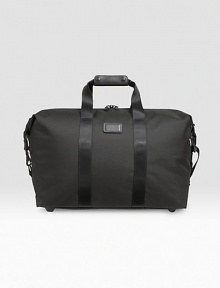 A classic soft satchel design in a smaller size, ideal for overnight or more relaxed travel with a roomy main compartment and sturdy ballistic nylon construction. Zip closure Removable, adjustable shoulder strap Carry handles with leather wrap Interior zip pocket and key hook 20W X 14H X 9D Imported A classic soft satchel design in a smaller size, ideal for overnight or more relaxed travel with a roomy main compartment and sturdy ballistic nylon construction. Zip closure Removable, adjustable shoulder strap Carry handles with leather wrap Interior zip pocket and key hook 20W X 14H X 9D Imported