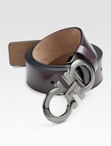 Smooth Italian leather has an adjustable design and polished double gancini brass buckle with subtle logo engraving.CalfskinBrass buckleAbout 1¼ wideMade in Italy