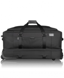 Move on! This durable, high-performance rolling duffel makes an easy science of travel with a structured bottom compartment for shoes & gear and a spacious main compartment with tie-down straps to keep clothes wrinkle-free and secure. Multiple organizer pockets and easy-glide wheels take the hassle out of packing and getting there. 5-year warranty. Move on! This durable, high-performance rolling duffel makes an easy science of travel with a structured bottom compartment for shoes & gear and a spacious main compartment with tie-down straps to keep clothes wrinkle-free and secure. Multiple organizer pockets and easy-glide wheels take the hassle out of packing and getting there. 5-year warranty.