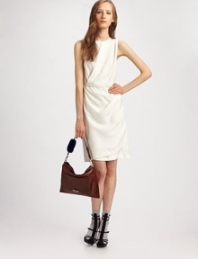 A study in modern minimalism, this elegant shift wraps around the body in a draped silhouette.Jewel neckline Sleeveless Gathered bodice High waist Wrap-front skirt Silk lining About 23 from natural waist Tencel; dry clean Imported