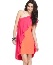 A bright overlay drapes this one-shoulder sheath dress, creating a dramatic, colorblocked experience! From REIGN. A bright overlay drapes this one-shoulder sheath dress, creating a dramatic, colorblocked experience! From REIGN.
