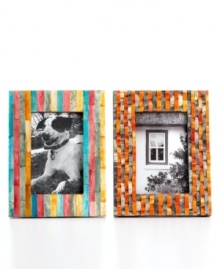 Bone tiles streaked with bright orange and warm gray make this Purva picture frame a stylish way to showcase your favorite people and places. Bone tiles streaked with bright orange and warm gray make this Purva picture frame a stylish way to showcase your favorite people and places.