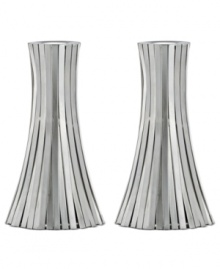 Always shining, the Silver Vertical Bound candlestick from Donna Karan Lenox is wrapped in long metal channels that overlap to create a simple cone shape. Always shining, the Silver Vertical Bound candlestick from Donna Karan Lenox is wrapped in long metal channels that overlap to create a simple cone shape.