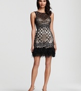 Get noticed in this decadent beaded dress from Sue Wong, accented with airy feathers at the hem.
