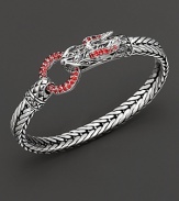 Eastern elements inform John Hardy's dragon head bracelet, featuring a polished silver link band and dragon head clasp with red sapphire.