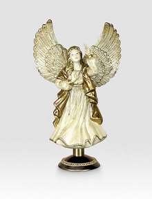 From the Jay Strongwater Angelic collection a palette of creams, golds and silver accents have been painted on this finely detailed Angel Tree Topper.Stand includedCrystalGlassHandmade, hand-painted and hand-set15H X 9W X 5.5DImported