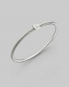 From the Cable Bangle collection. Slim sterling silver has classic cable design and sparkling square diamond accent. Diamonds, 0.07 tcw Sterling silver Diameter, about 2½ Imported