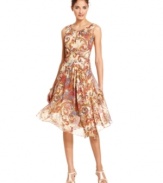 Evan Picone's breezy silhouette is perfect for all the summer events you have lined up with its asymmetrical details and swirling print.