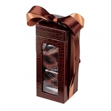 Nicely wrapped in a beautiful box and bow, these chocolate-covered confections are a mouthwatering delight - perfect for gift giving.