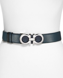 Constructed in rich leather and accented by bold hardware, this reversible belt from Salvatore Ferragamo adds polished versatility to every look.