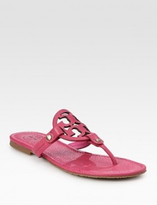 Pebbled leather thong with classic oversized logo detail. Pebbled leather upperLeather liningRubber solePadded insoleImportedOUR FIT MODEL RECOMMENDS ordering one half size down as this style runs large. 