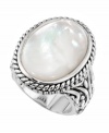 Capture free-spirited style with this chic cocktail ring. Crafted by City by City, ring features an oval-shaped mother of pearl center stone surrounded by an intricate rope edging and detailed band. Crafted in silver tone mixed metal. Size 7 and 8.