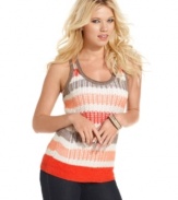 Stock-up on warm-weather knits! Featuring a succession of thick and colorful stripes, this tank style from GUESS? adds texture to your jeans and cami ensemble.