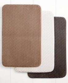Step it up. Featuring an ultra-soft textured jacquard weave and plush memory foam insert, this Melody Memory Foam rug conforms to the contours of your foot for the ultimate in support and comfort. Step it up. Featuring an ultra-soft textured jacquard weave and plush memory foam insert, this Melody Memory Foam rug conforms to the contours of your foot for the ultimate in support and comfort.