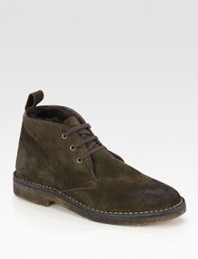 Ultra-soft shearling lines this casual suede favorite, with contrast stitching and a rubber sole for added traction. Rubber heel, 1 (25mm)Suede upperShearling liningRubber solePadded insoleMade in Italy