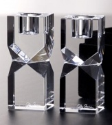 Give decor a distinctly modern edge with Lexington candle holders. Heavy optic glass cut in bold geometric shapes bring acclaimed designer Oleg Cassini's keen sense of style right into your living room.