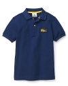 The iconic Lacoste polo shirt features a bigger version of the signature alligator logo and contrast trim.
