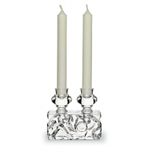 Inspired by nature and the Dutch art of lace-making, this intriguing candleholder, designed by Marcel Wanders, is a part of the designer's United Crystal Woods collection.