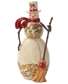 Brilliant gold and burgundy details light up this folksy snowman. With broom in hand and windswept scarf around his neck, this figurine adds new personality to the season. Brilliant gold and burgundy details light up this folksy snowman. With broom in hand and windswept scarf around his neck, this figurine adds new personality to the season.
