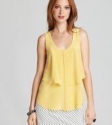 This Cynthia Steffe blouse works its feminine charm with a lemony hue and flouncy silhouette.