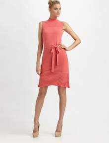 This clingy textured knit skims the body in a belted mock-neck sheath.Mock-neckSleevelessBodice seamsSelf-beltCenter back zipperAbout 22 from natural waist72% viscose/28% polyesterDry cleanImportedModel shown is 5'9 (175cm) wearing US size Small.