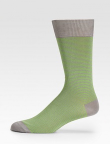 Super soft, with a hint of stretch in neatly striped cotton knit.Mid-calf height80% cotton/20%nylonMachine washImported