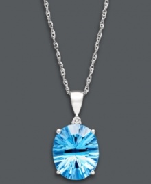 Standout style in cool blue hues. This stunning pendant features an oval-cut blue topaz (5 ct. t.w.) and a sparkling diamond accent. Setting and chain crafted in 14k white gold. Approximate length: 16 inches. Approximate drop: 3/4 inch.
