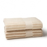 The rich stripe weave on this sculpted Ralph by Ralph Lauren hand towel creates incomparable luxury and absorbency.