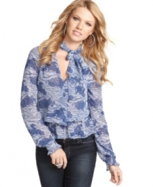 Nab ladylike style in this floral print top from Guess? that flaunts the season's hottest detail – a bow tie! Nab ladylike style in this floral print top from Guess? that flaunts the season's hottest detail – a bow tie!