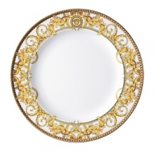 The most legendary figure of Asian mythology, the red dragon rises majestically from this fabulously opulent dinnerware from Rosenthal Meets Versace, conveying all its might and glory. Each piece features ornate golden baroque patterns and four small medallions representing the sun, and the Versace medusa decorates the background.