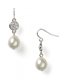 A contemporary take on classic earrings with tiny crystal stones and glass pearls. A contemporary take on classic earrings with tiny crystal stones and glass pearls.