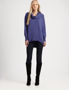 Luxe merino wool gives this simply sophisticated knit must-have appeal. Funnel neckRaglan sleevesCurved hi-lo hemRibbed trimPull-on styleAbout 32 from shoulder to hemMerino woolDry cleanImported of Italian fabric Model shown is 5'10 (177cm) wearing US size Small. 