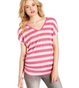 Born to lounge: stripes galore evoke easygoing style on this relaxed fit tee from Pink Rose that sports a fun, back cutout!