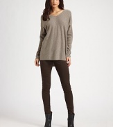 Draped wool and cashmere v-neck has dropped shoulders, long dolman sleeves and a hi-low hem that hits below the hips. V-neckDropped shouldersLong dolman sleevesHi-low hem hits below the hips70% wool/30% cashmereDry cleanImportedModel shown is 5'10 (177cm) wearing US size Small.