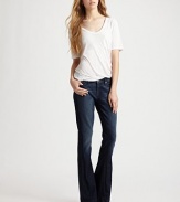 Fashion-forward flares with low-rise waist in subtly sanded stretch denim.THE FITFitted through hips and thighs Medium rise, about 8 Inseam, about 34¼THE DETAILSZip fly Five-pocket style Plain back patch pockets 78% cotton/20% Polyester/2% spandex Machine wash Made in USA of imported fabric