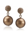 Deck yourself out in these dazzling drops by Carolee. Earrings feature a crystal coated stud with a large, gold, glass pearl (14 mm) drop. Crafted in gold-plated mixed metal. Surgical steel posts. Approximate drop: 1 inch.