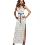 BCBGMAXAZRIA's luxe lace evening gown will steal the show with its sleek silhouette and sexy side slit.