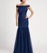 This romantic design features an alluring off-the-shoulder neckline and a full trumpet skirt.Off-the-shoulder necklineAllover ruchingTrumpet skirtLow back with concealed zipFully linedAbout 46 from natural waistNylonDry cleanImportedModel shown is 5'11 (180cm) wearing US size 4. 