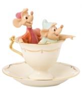 Cinderella's little helpers, Jaq and Gus, go for a ride in a gold-patterned teacup fit for a princess and made for Disney fans in beautiful Lenox porcelain.