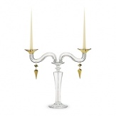 Inspired by the tales of One Thousand and One Nights, this gilded candelabra, designed by Mathias, is romantic and elegant, a grand addition to any room.