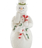 With a smile frozen on his face, a giant candy cane and quaint holly accents, this sweet snowman figurine coordinates beautifully with classic Holiday decor by Lenox.