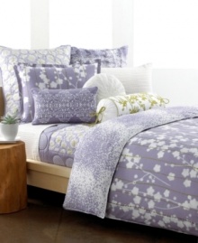The Sakura comforter set from Style&co. presents a chic floral cut-out over soft purple with detailed green line embroidery. Digital purple droplets on the reverse create effortless charm, fit for the modern bedroom. The Sakura comforter set from Style&co. presents a chic floral cut-out over soft purple with detailed green line embroidery. Digital purple droplets on the reverse create effortless charm, fit for the modern bedroom.
