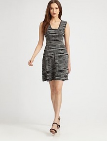 A stylish sheath featuring the perfect amount of stretch for a great fit. This design features an alluring neckline for instant appeal.Feminine necklineSleevelessBanded waistPull-on styleAbout 22 from natural waist77% viscose/23% polyesterDry cleanMade in Italy of imported fabric Model shown is 5'11 (180cm) wearing US size 4. Additional Information Women's Premier Designer & Contemporary Size Guide 