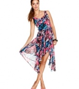 Set yourself up as fashion's chic color guard in this vibrant asymmetrical dress from Material Girl!