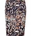 Chic black and frappe Zanzibar skirt from Steffen Schraut - This stylish animal print skirt will kick up your day or night look - All-over animal print with black background - Slim pencil silhouette - Wear with a sheer blouse, oversized cardigan, and strappy platform heels