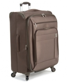 Fly lighter. A built-in overweight indicator makes it easy to avoid airline fees and pack like a pro. Crafted from an innovative lightweight Dura-Tec material, this suitcase has a fully integrated fiberglass frame that rolls effortlessly on four multi-direction spinners. A fully-lined expandable interior uses tie-down straps to keep your belongings in place & your clothes wrinkle-free. Fly lighter. A built-in overweight indicator makes it easy to avoid airline fees and pack like a pro. Crafted from an innovative lightweight Dura-Tec material, this suitcase has a fully integrated fiberglass frame that rolls effortlessly on four multi-direction spinners. A fully-lined expandable interior uses tie-down straps to keep your belongings in place & your clothes wrinkle-free.