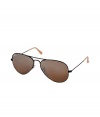 Originally designed for fighter pilots, Ray-Bans Aviator sunglasses are an iconic choice guaranteed to take you through the seasons in cool style - Black metal frames, crystal gold mirrored lenses, clear nose pieces, nude earpieces - Lens filter category 3, prescription friendly - Comes with a logo-stamped semi-hard carrying case - Amp up your look with a leather bomber jacket and edgy lace-up boots