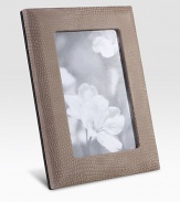 Display your memories in this handmade frame, wrapped in viper-printed nubuck leather with sturdy metal easel and convenient rear drop-down door for easy access.LeatherMade in USA DIMENSION INFORMATION 4 X 65 X 7