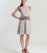 Delight in this MARC BY MARC JACOBS cotton dress featuring mixed floral prints, flutter sleeves and a demure flare skirt. Nipped at the waist, the silhouette flaunts your trim figure and soft sense of style.