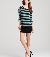 This Bailey 44 dress boasts a cool two-in-one look with a boldly striped top layered over an ultra-fitted skirt.